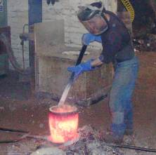 Photo showing Clearing off the slag from the surface