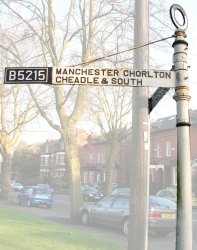 Finger post type sign post with added number plate and additional stay