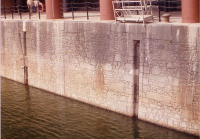 Photo of Liverpool dock quay wall with inset chains