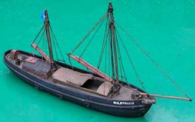 Photo of model tamar barge with furled sails