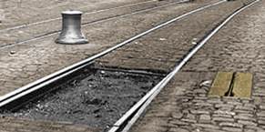 Inset track in a goods yard, note the design of the point blades and the point operating lever recessed into the yard roadway