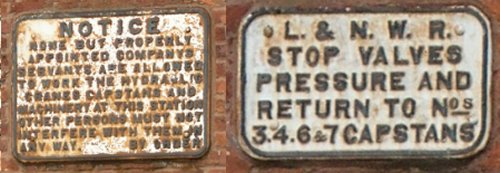 Notices associated with hydraluc machinery at a goods warehouse
