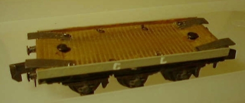 Model of furniture truck showing the securing rings and loading pulleys