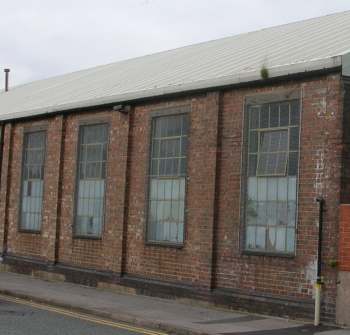 Photo showing pressed metal post-war roofing