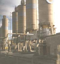 Photo showing 1960s cement depot cement silos