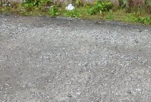 Photo of an un-tarred Macadam road