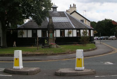 Marooned drinking fountain on a corner