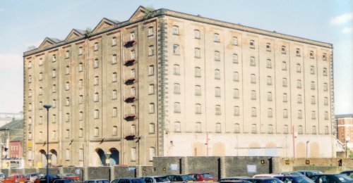 hoto of a large canal warehouse in Manchester