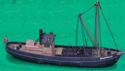 Photo of a model of a small coastal steam vessel