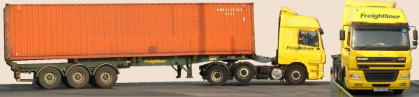 Photo of a modern Freightliner lorry showing all yellow livery