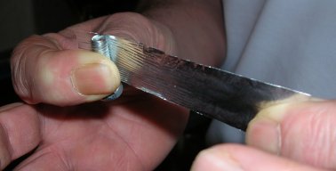 Making corrugated iron sheet using foil and a bolt